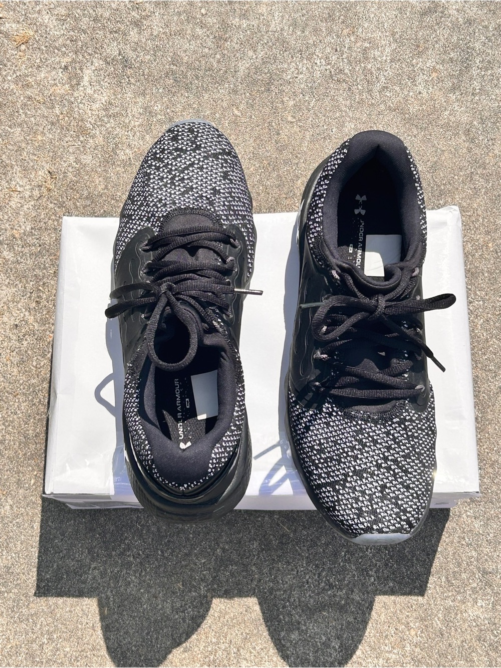 Under Armour Men’s Black and White Knit Running Sneakers